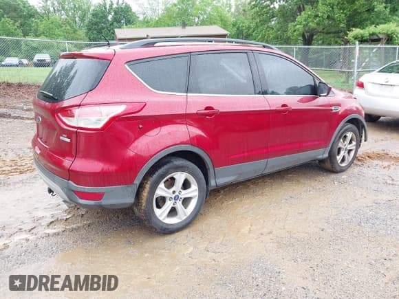 ✅ 2013 Ford Escape SE • VIN: 1FMCU0GX2DUD33640 • Lot: 42255552. Listed on IAAI with 150,018 mi. Free auction sales archive from the USA and detailed vehicle history report at DreamBid. Image 4.