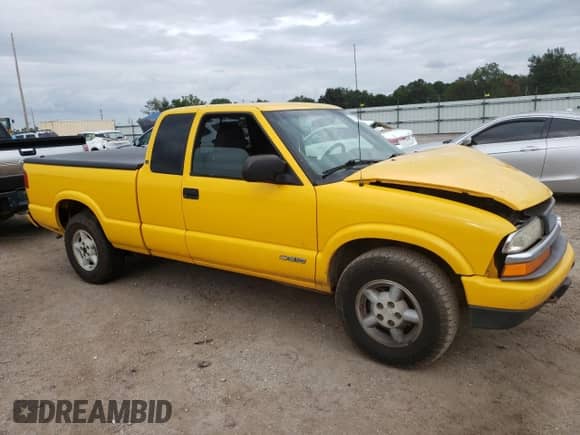 2003 Chevrolet S-10 LS z VIN 1GCDT19X738170604, wystawiony jako Copart lot #71738764 z przebiegiem Nie podano mil oraz Szkoda całkowita • Salvage title. Historia ofert i sprzedaży dostępna na DreamBid. Obrazek 4.