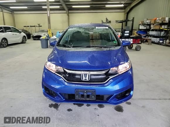 ✅ 2019 Honda Fit LX • VIN: 3HGGK5H4XKM718542 • Lot: 86643045. Wystawiony na Copart z przebiegiem 10 581 mil. Bezpłatny archiwum sprzedaży aukcyjnych z USA i szczegółowy raport historii pojazdu na DreamBid. Zdjęcie 14.