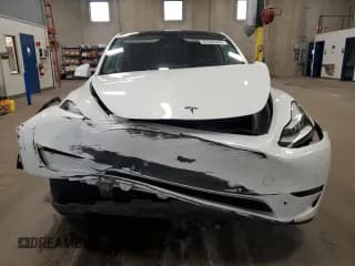 ✅ 2021 Tesla Model Y Long Range • VIN: 5YJYGDEE3MF145325 • Lot: 82555245. Listed on Copart with 83,636 mi. Free auction sales archive from the USA and detailed vehicle history report at DreamBid. Image 5.