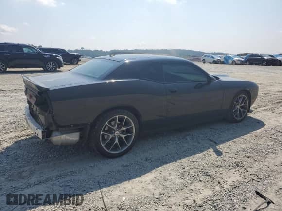 2022 Dodge Challenger GT with VIN 2C3CDZJG4NH237471, listed as a Copart auction lot 71077195 with 63,876 mi miles and Salvage title. Bid and sale history available at DreamBid. Image 3.