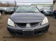 ✅ 2004 Mitsubishi Lancer LS • VIN: JA3AJ36E34U036316 • Lot: 87617655. Listed on Copart with 140,855 mi. Free auction sales archive from the USA and detailed vehicle history report at DreamBid. Image 5.