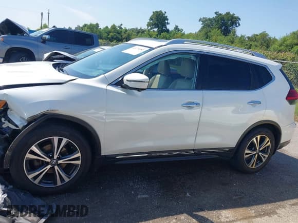 ✅ 2017 Nissan Rogue SV • VIN: JN8AT2MT9HW151511 • Lot: 43174081. Listed on IAAI with 104,937 mi. Free auction sales archive from the USA and detailed vehicle history report at DreamBid. Image 14.