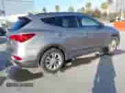 2017 Hyundai Santa Fe 2.0T z VIN 5XYZU4LA7HG406516, wystawiony jako IAAI lot #41847977 z przebiegiem 105 299 mil mil oraz . Historia ofert i sprzedaży dostępna na DreamBid. Obrazek 4.