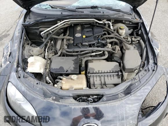 ✅ 2012 Mazda MX-5 Miata Grand Touring • VIN: JM1NC2NF8C0219704 • Лот: 84722534. Опубликован ранее на Copart с пробегом Не указан. Бесплатный доступ к архиву аукционных продаж из США и подробный отчёт об истории автомобиля на DreamBid. Изображение 12.