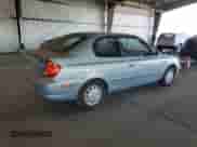 2005 Hyundai Accent GLS with VIN KMHCG35C85U321440, listed as a Copart auction lot 67861135 with 49,708 mi miles and Salvage title. Bid and sale history available at DreamBid. Image 3.