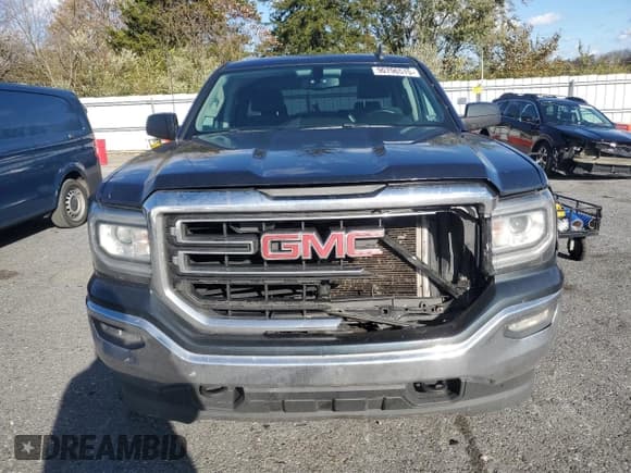 ✅ 2017 GMC Sierra 1500 SLE • VIN: 1GTV2MEC5HZ344702 • Лот: 90796515. Опубликован ранее на Copart с пробегом 327 144 миль. Бесплатный доступ к архиву аукционных продаж из США и подробный отчёт об истории автомобиля на DreamBid. Изображение 5.