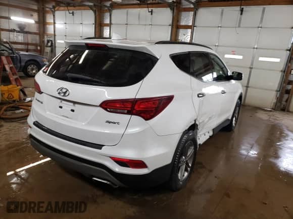 ✅ 2018 Hyundai Santa Fe 2.4L • VIN: 5NMZU3LB7JH101659 • Lot: 71634882. Wystawiony na Copart z przebiegiem 90 025 mil mil. Skorzystaj z bezpłatnego archiwum sprzedaży aukcyjnych z USA i zobacz szczegółowy raport historii pojazdu na DreamBid. Zdjęcie 3.