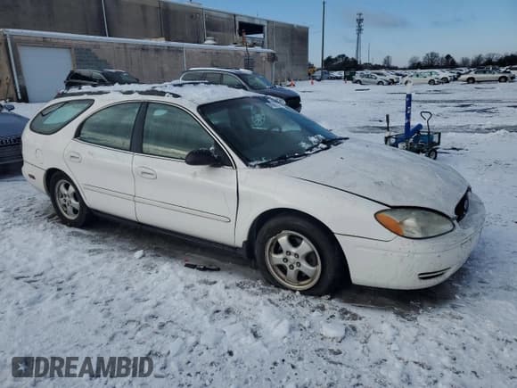 ✅ 2005 Ford Taurus • VIN: 1FAHP58255A219979 • Lot: 41699265. Listed on Copart with 137,804 mi. Free auction sales archive from the USA and detailed vehicle history report at DreamBid. Image 4.