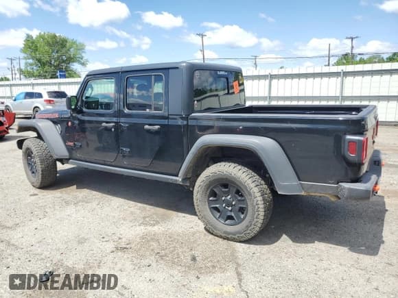✅ 2023 Jeep Gladiator Mojave • VIN: 1C6JJTEG9PL510727 • Lot: 52186175. Listed on Copart with 16,793 mi. Free auction sales archive from the USA and detailed vehicle history report at DreamBid. Image 2.