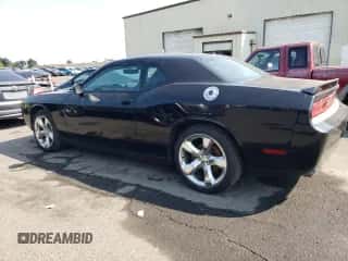 2014 Dodge Challenger SXT с VIN 2C3CDYAG4EH258427, выставлен на аукционе Copart как лот 81430765 с пробегом Не указан миль и Списание • Salvage title. История ставок и продаж доступна на DreamBid. Изображение 2.