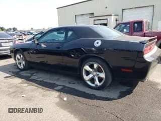 ✅ 2014 Dodge Challenger SXT • VIN: 2C3CDYAG4EH258427 • Lot: 81430765. Wystawiony na Copart z przebiegiem Nie podano. Bezpłatny archiwum sprzedaży aukcyjnych z USA i szczegółowy raport historii pojazdu na DreamBid. Zdjęcie 2.