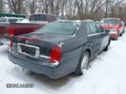 ✅ 2001 Cadillac DeVille • VIN: 1G6KD54Y31U259475 • Lot: 41566992. Listed on IAAI with Not provided. Free auction sales archive from the USA and detailed vehicle history report at DreamBid. Image 4.