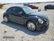✅ 2016 Volkswagen Beetle SE • VIN: 3VWJ17ATXGM623892 • Lot: 69116435. Listed on Copart with 89,052 mi. Free auction sales archive from the USA and detailed vehicle history report at DreamBid. Image 4.