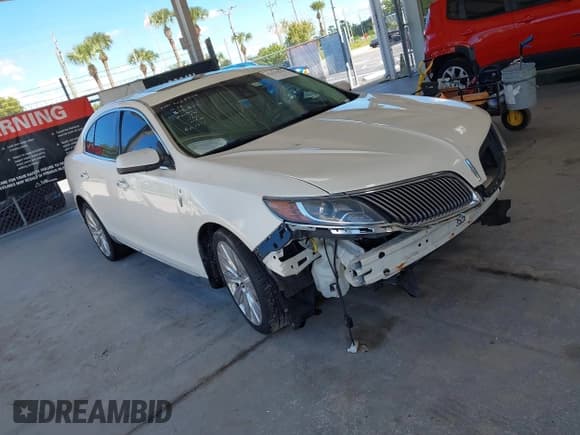 ✅ 2013 Lincoln MKS EcoBoost • VIN: 1LNHL9FT8DG607711 • Lot: 43435570. Wystawiony na IAAI z przebiegiem 141 467 mil. Bezpłatny archiwum sprzedaży aukcyjnych z USA i szczegółowy raport historii pojazdu na DreamBid. Zdjęcie 1.