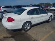 ✅ 2001 Ford Taurus SES • VIN: 1FAFP55U21G266598 • Lot: 43221102. Listed on IAAI with 313,632 mi. Free auction sales archive from the USA and detailed vehicle history report at DreamBid. Image 4.