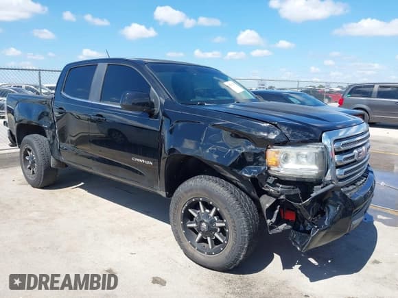 ✅ 2016 GMC Canyon 2WD SLE • VIN: 1GTG5CE3XG1160847 • Lot: 43287308. Listed on IAAI with 141,323 mi. Free auction sales archive from the USA and detailed vehicle history report at DreamBid. Image 1.