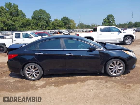 2013 Hyundai Sonata SE with VIN 5NPEC4AB5DH531028, listed as a IAAI auction lot 43247043 with 188,338 mi miles and . Bid and sale history available at DreamBid. Image 14.