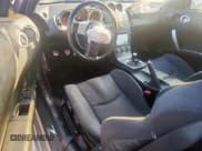 ✅ 2005 Nissan 350Z • VIN: JN1AZ34D05M605342 • Лот: 69046905. Опубликован ранее на Copart с пробегом 84 516 миль. Бесплатный доступ к архиву аукционных продаж из США и подробный отчёт об истории автомобиля на DreamBid. Изображение 8.