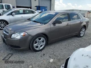✅ 2011 Chevrolet Malibu 1LS • VIN: 1G1ZB5E15BF120787 • Lot: 60220634. Listed on Copart with 153,316 mi. Free auction sales archive from the USA and detailed vehicle history report at DreamBid. Image 1.