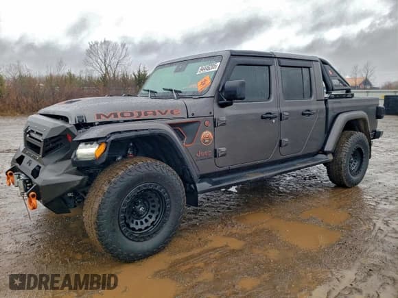✅ 2022 Jeep Gladiator Mojave • VIN: 1C6JJTEG8NL153411 • Lot: 94446285. Wystawiony na Copart z przebiegiem 74 385 mil. Bezpłatny archiwum sprzedaży aukcyjnych z USA i szczegółowy raport historii pojazdu na DreamBid. Zdjęcie 1.