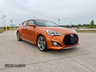 2014 Hyundai Veloster Turbo с VIN KMHTC6AEXEU198728, выставлен на аукционе Copart как лот 91010885 с пробегом 21 656 миль миль и Чистый • Clean title. История ставок и продаж доступна на DreamBid. Изображение 1.