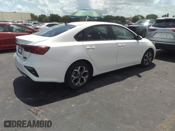 ✅ 2021 Kia Forte LXS • VIN: 3KPF24AD6ME322989 • Lot: 42010435. Listed on IAAI with 84,346 mi. Free auction sales archive from the USA and detailed vehicle history report at DreamBid. Image 4.