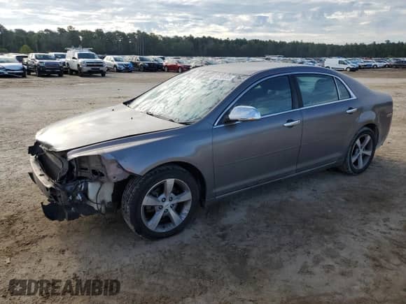 2012 Chevrolet Malibu 1LT with VIN 1G1ZC5E01CF103720, listed as a Copart auction lot 84799835 with 208,826 mi miles and Salvage title. Bid and sale history available at DreamBid. Image 1.