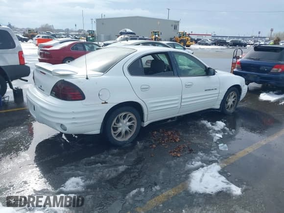 ✅ 1999 Pontiac Grand Am SE1 • VIN: 1G2NE52E3XM837376 • Lot: 41552372. Listed on IAAI with Not provided. Free auction sales archive from the USA and detailed vehicle history report at DreamBid. Image 4.