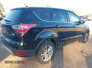 ✅ 2017 Ford Escape SE • VIN: 1FMCU0GD3HUB51862 • Lot: 43790320. Listed on IAAI with 204,800 mi. Free auction sales archive from the USA and detailed vehicle history report at DreamBid. Image 4.