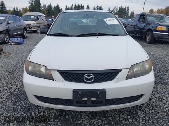 ✅ 2003 Mazda Protege DX • VIN: JM1BJ225331141069 • Лот: 43688727. Опубликован ранее на IAAI с пробегом 136 202 миль. Бесплатный доступ к архиву аукционных продаж из США и подробный отчёт об истории автомобиля на DreamBid. Изображение 12.
