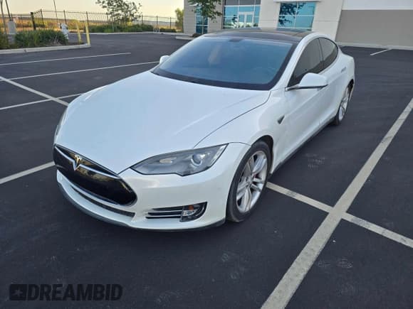 ✅ 2012 Tesla Model S • VIN: 5YJSA1CN1CFP02658 • Lot: 61011015. Listed on Copart with 127,241 mi. Free auction sales archive from the USA and detailed vehicle history report at DreamBid. Image 2.
