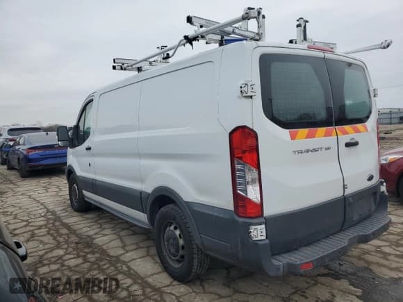 ✅ 2016 Ford Transit Cargo • VIN: 1FTYE1ZM0GKA81094 • Lot: 42951715. Listed on Copart with 112,201 mi. Free auction sales archive from the USA and detailed vehicle history report at DreamBid. Image 2.