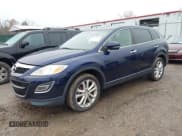 ✅ 2011 Mazda CX-9 Grand Touring • VIN: JM3TB2DA1B0319892 • Lot: 43715618. Wystawiony na IAAI z przebiegiem 156 387 mil. Bezpłatny archiwum sprzedaży aukcyjnych z USA i szczegółowy raport historii pojazdu na DreamBid. Zdjęcie 2.