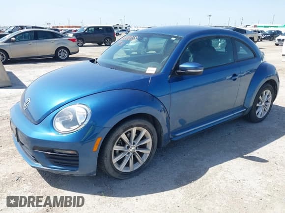✅ 2018 Volkswagen Beetle S • VIN: 3VWFD7AT6JM711309 • Lot: 42287058. Listed on IAAI with 98,644 mi. Free auction sales archive from the USA and detailed vehicle history report at DreamBid. Image 17.