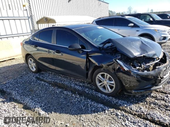✅ 2017 Chevrolet Cruze LT • VIN: 1G1BE5SM0H7115040 • Lot: 38282033. Listed on Copart with 97,465 mi. Free auction sales archive from the USA and detailed vehicle history report at DreamBid. Image 4.