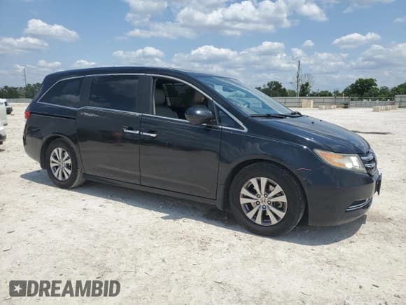 ✅ 2014 Honda Odyssey EX-L • VIN: 5FNRL5H64EB104570 • Lot: 56382095. Listed on Copart with 172,706 mi. Free auction sales archive from the USA and detailed vehicle history report at DreamBid. Image 4.