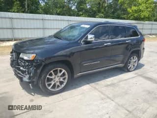 ✅ 2015 Jeep Grand Cherokee Summit • VIN: 1C4RJEJG7FC185426 • Lot: 62562735. Listed on Copart with 133,418 mi. Free auction sales archive from the USA and detailed vehicle history report at DreamBid. Image 1.