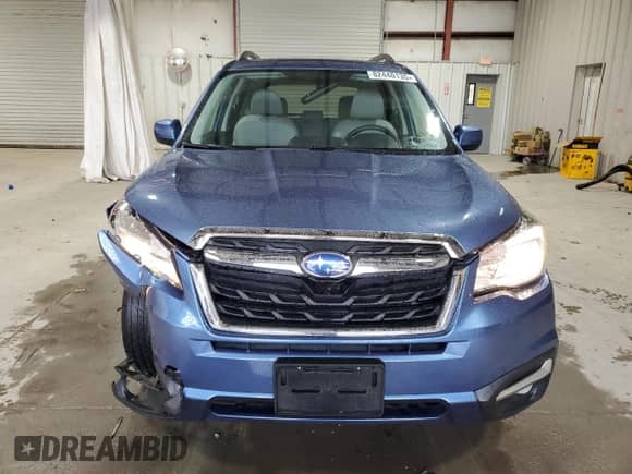 2017 Subaru Forester Limited with VIN JF2SJAJC5HH527843, listed as a Copart auction lot 82440135 with 64,197 mi miles and Salvage title. Bid and sale history available at DreamBid. Image 5.