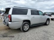 ✅ 2018 Chevrolet Suburban LT • VIN: 1GNSCHKC4JR249122 • Лот: 81604185. Опубликован ранее на Copart с пробегом 121 859 миль. Бесплатный доступ к архиву аукционных продаж из США и подробный отчёт об истории автомобиля на DreamBid. Изображение 3.