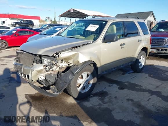 ✅ 2011 Ford Escape XLT • VIN: 1FMCU0D71BKA79335 • Лот: 43655850. Опубликован ранее на IAAI с пробегом 127 739 миль. Бесплатный доступ к архиву аукционных продаж из США и подробный отчёт об истории автомобиля на DreamBid. Изображение 19.