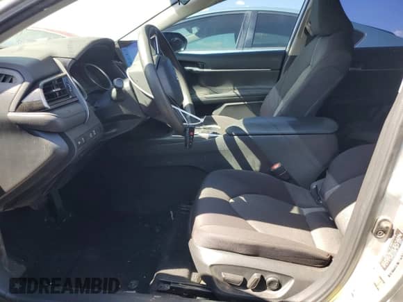 2021 Toyota Camry Hybrid LE with VIN 4T1C31AK5MU554381, listed as a Copart auction lot 69998775 with 104,313 mi miles and Salvage title. Bid and sale history available at DreamBid. Image 7.