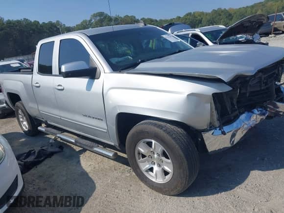2018 Chevrolet Silverado 1500 LT z VIN 1GCRCREH0JZ287029, wystawiony jako IAAI lot #43252285 z przebiegiem 154 918 mil mil oraz . Historia ofert i sprzedaży dostępna na DreamBid. Obrazek 13.