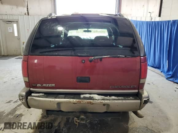 1997 Chevrolet Blazer LS with VIN 1GNDT13W0V2220109, listed as a Copart auction lot 87015214 with 172,531 mi miles and Salvage title. Bid and sale history available at DreamBid. Image 6.