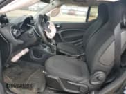 ✅ 2016 Smart fortwo Prime • VIN: WMEFJ5DA4GK054621 • Lot: 68703105. Wystawiony na Copart z przebiegiem 70 845 mil. Bezpłatny archiwum sprzedaży aukcyjnych z USA i szczegółowy raport historii pojazdu na DreamBid. Zdjęcie 7.