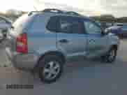 2006 Hyundai Tucson GL with VIN KM8JM12B86U411849, listed as a Copart auction lot 69301264 with 125,056 mi miles and Salvage title. Bid and sale history available at DreamBid. Image 3.