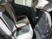 ✅ 2020 Chevrolet Bolt EV LT • VIN: 1G1FW6S09L4134746 • Lot: 83064324. Wystawiony na Copart z przebiegiem 18 826 mil. Bezpłatny archiwum sprzedaży aukcyjnych z USA i szczegółowy raport historii pojazdu na DreamBid. Zdjęcie 10.