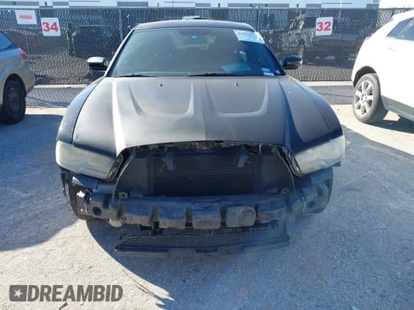 ✅ 2012 Dodge Charger SE • VIN: 2C3CDXBG1CH102593 • Lot: 43583549. Listed on IAAI with 166,100 mi. Free auction sales archive from the USA and detailed vehicle history report at DreamBid. Image 6.