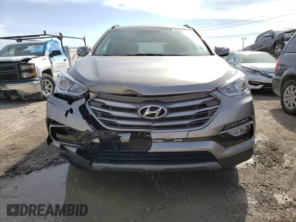 ✅ 2017 Hyundai Santa Fe 2.4L • VIN: 5NMZU3LB5HH002638 • Lot: 42825133. Wystawiony na Copart z przebiegiem 99 604 mil. Bezpłatny archiwum sprzedaży aukcyjnych z USA i szczegółowy raport historii pojazdu na DreamBid. Zdjęcie 5.