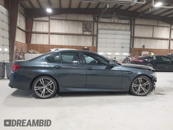 ✅ 2014 BMW M5 • VIN: WBSFV9C50ED097796 • Лот: 42098687. Опубликован ранее на IAAI с пробегом 154 980 миль. Бесплатный доступ к архиву аукционных продаж из США и подробный отчёт об истории автомобиля на DreamBid. Изображение 14.
